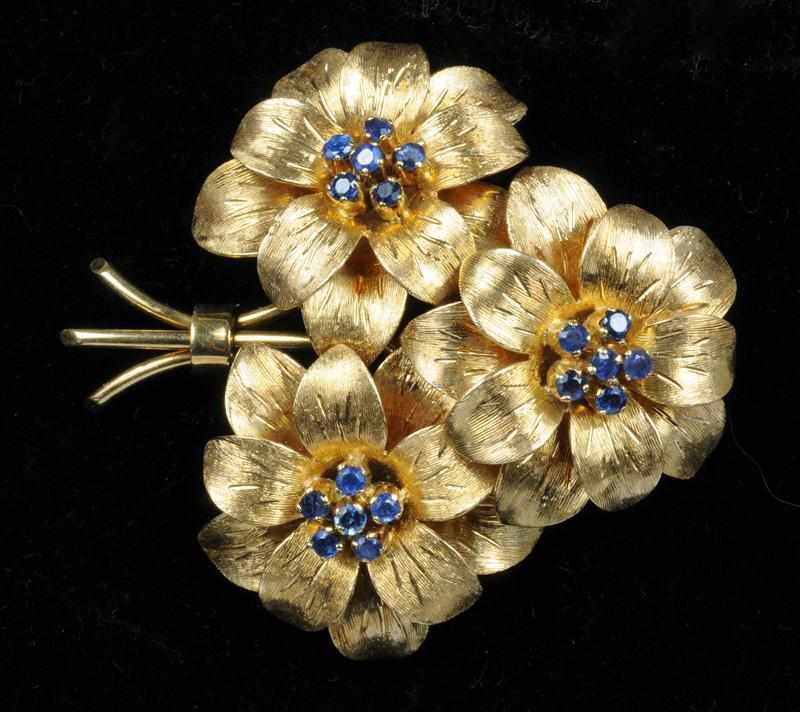 Appraisal: K GOLD AND SAPPHIRE FLOWER BROOCH SIGNED TIFFANY CO ITALY