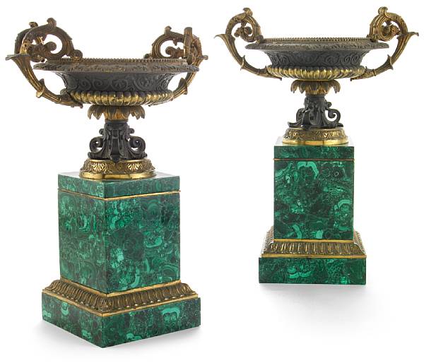 Appraisal: A pair of Empire style gilt and patinated bronze mounted