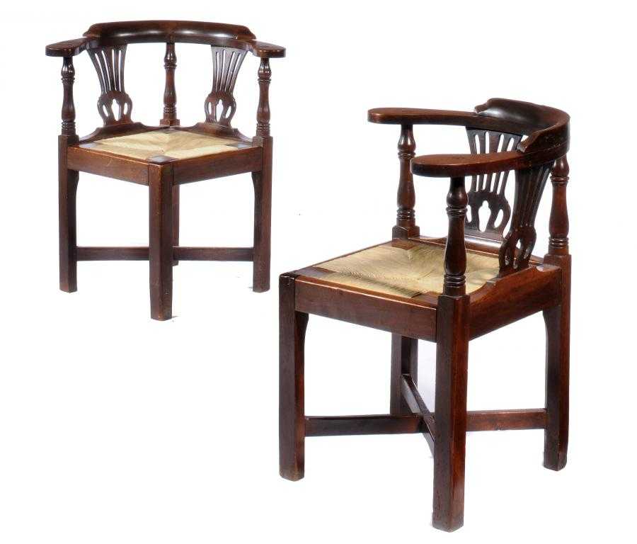 Appraisal: A PAIR OF GEORGE III FRUITWOOD ARMCHAIRS the armbow on