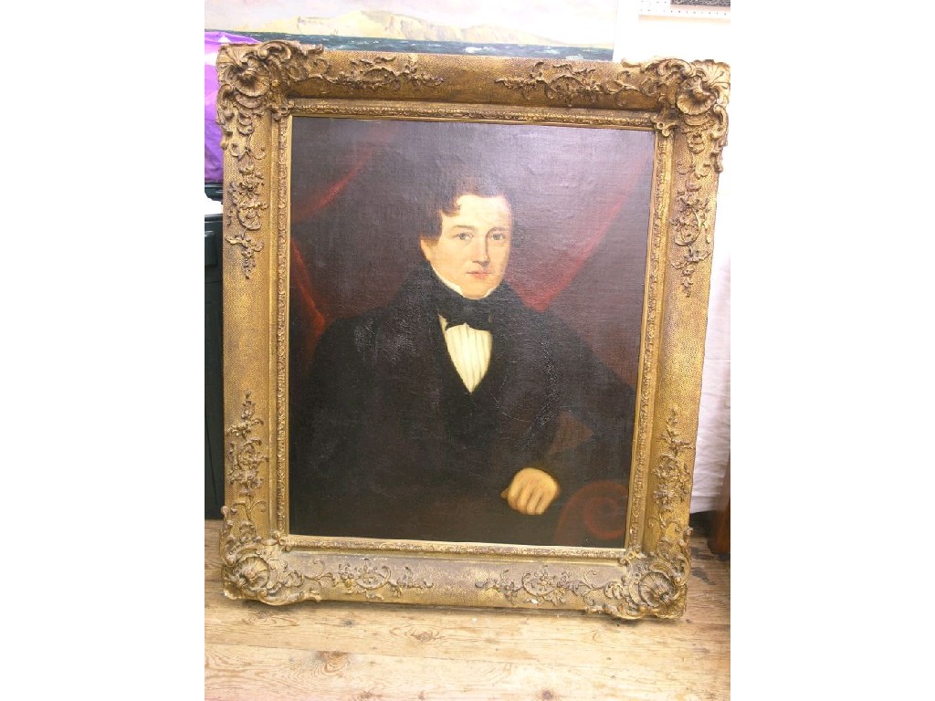 Appraisal: An early Victorian oil on canvas half-length portrait of a