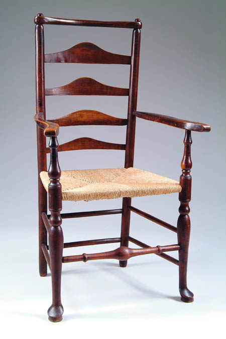 Appraisal: GEORGE III LADDERBACK ARM CHAIR Back fitted with four graduating