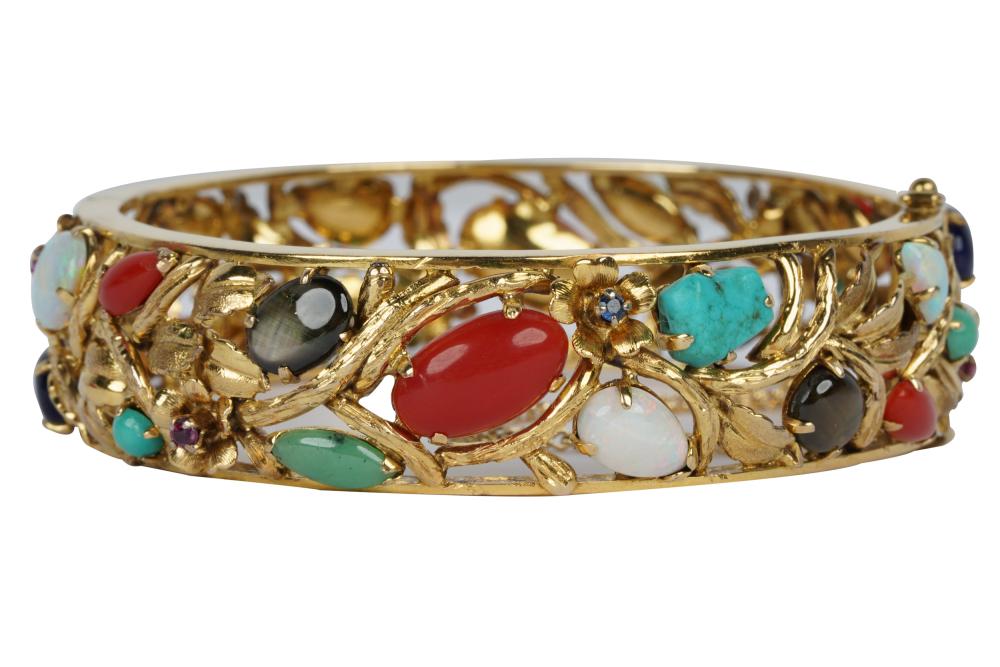 Appraisal: KARAT YELLOW GOLD MULTI-GEM BANGLE BRACELETcontaining six oval or triangle