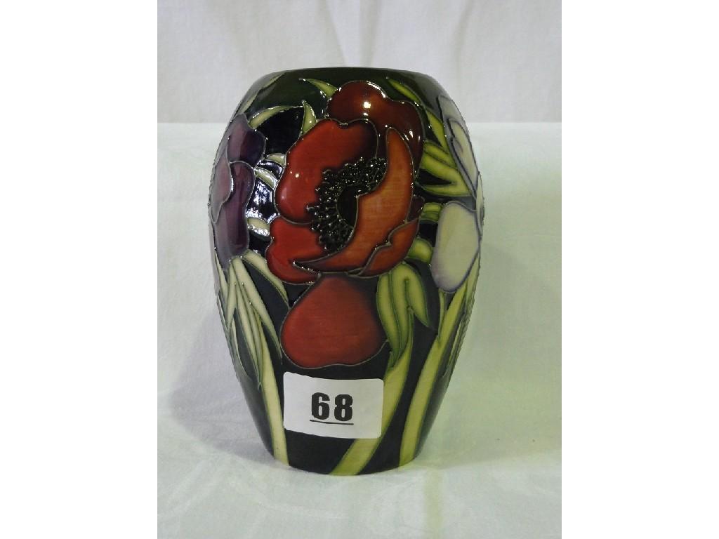 Appraisal: A green ground Moorcroft pottery vase of ovoid form with