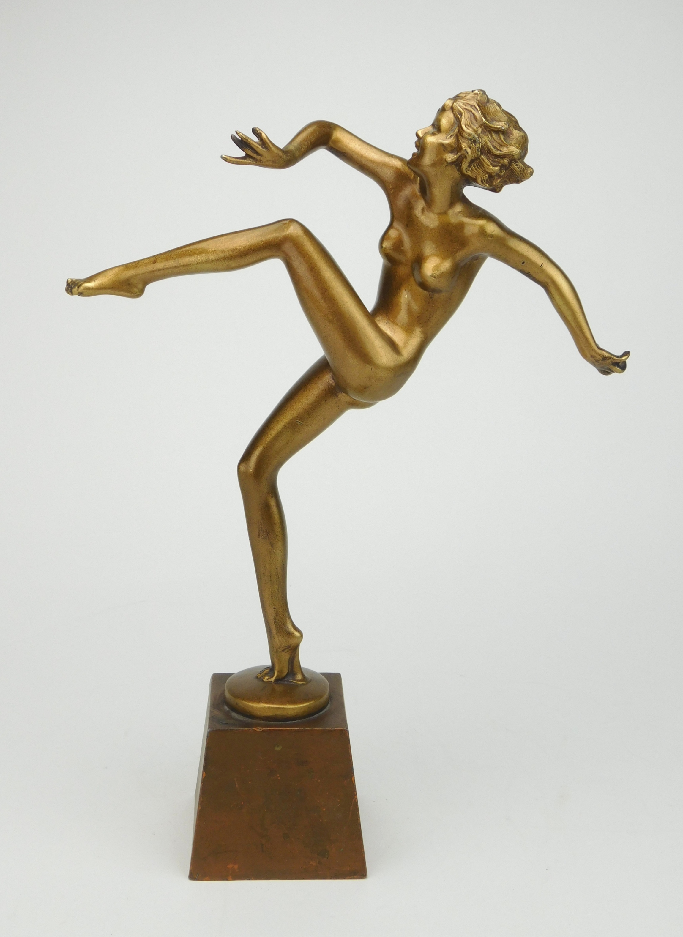 Appraisal: Aronson Ronson Art Deco female nude ''Kicking Dancer'' figural sculpture