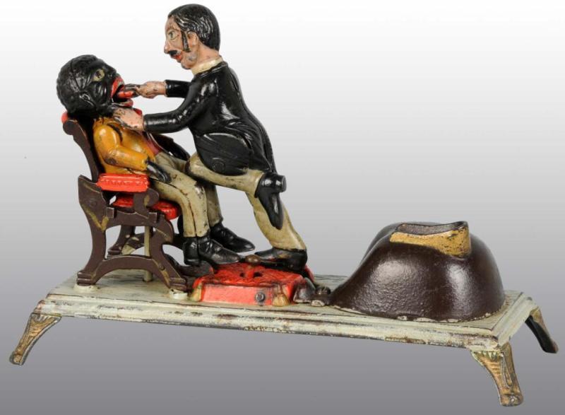 Appraisal: Cast Iron Dentist Mechanical Bank Description Manufactured by J E