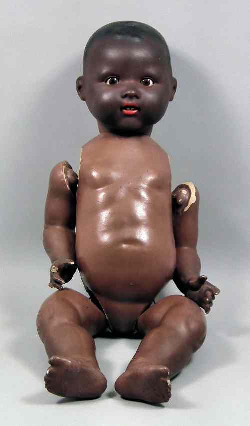 Appraisal: An Armand Marseille bisque headed coloured baby doll No K