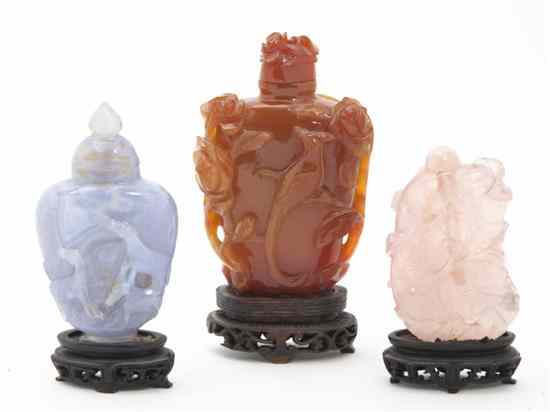 Appraisal: Three Hardstone Snuff Bottles comprising an agate carnelian and rose