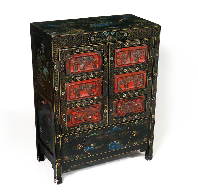 Appraisal: ORIENTAL BLACK LACQUER CABINET WITH CARVED PANELS Paint decoration over