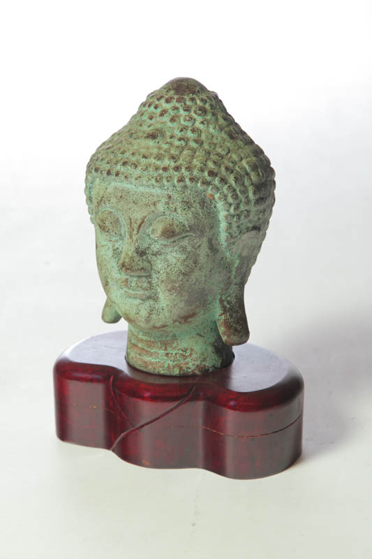 Appraisal: BRONZE BUDDHA HEAD Asian th century Hollow cast with applied