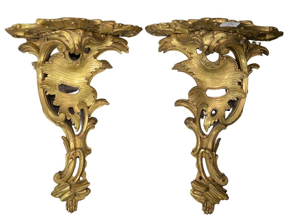 Appraisal: Pair of Giltwood Foliate and Scroll Carved Wall Brackets height