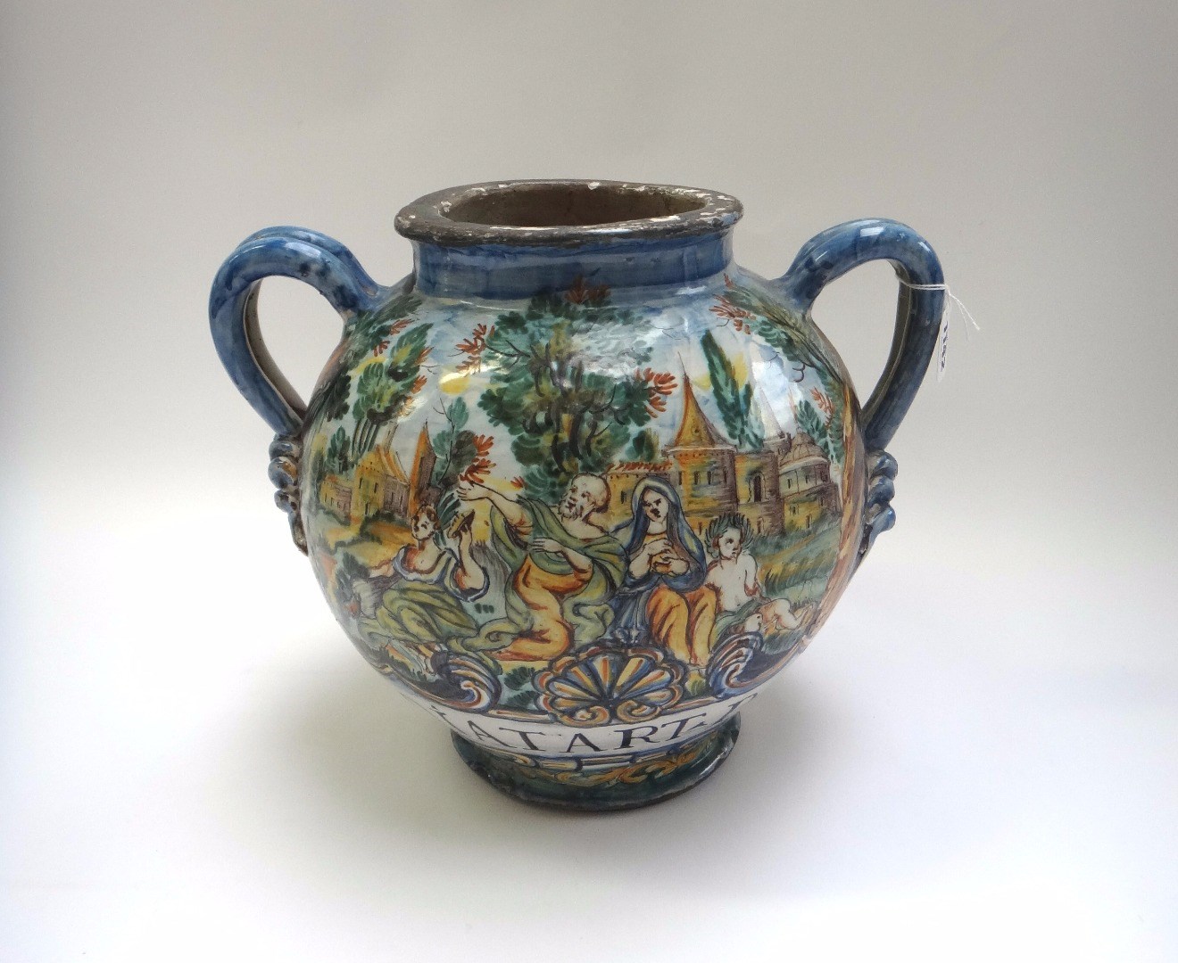 Appraisal: An Urbania maiolica two handled drug jar th century painted