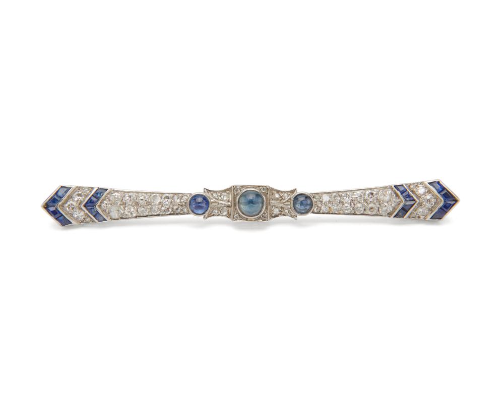 Appraisal: Platinum Sapphire and Diamond Bar Brooch with three bezel-set round