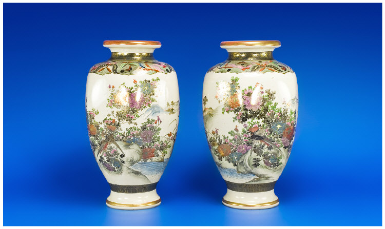 Appraisal: Satsuma Pair of Vases decorated with butterflies floral scenes and