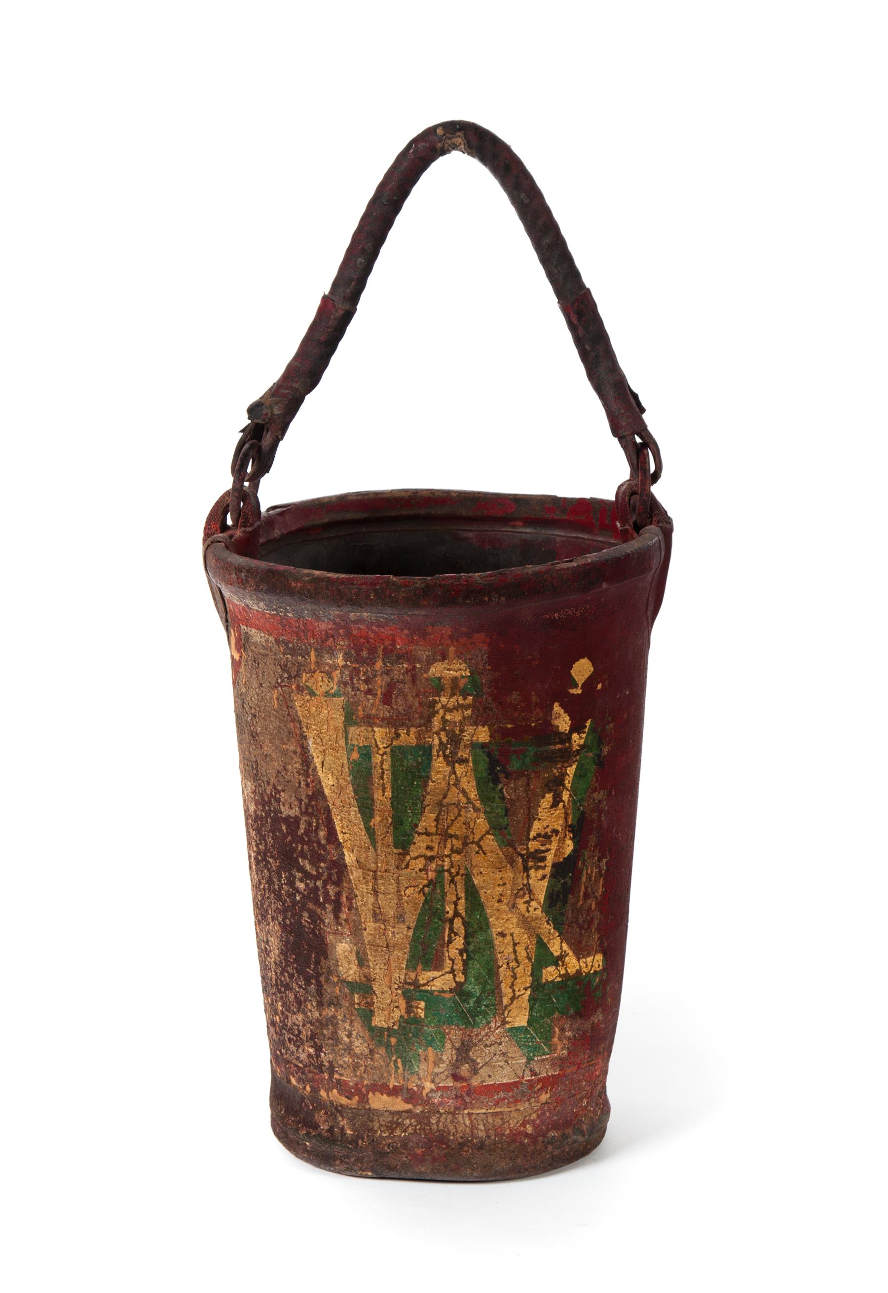 Appraisal: CANVAS FIRE BUCKET American th century Painted canvas with indistinct