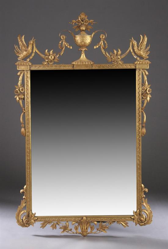 Appraisal: GEORGE III-STYLE CARVED GILTWOOD MIRROR th century Rectangular frame crested