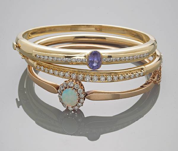 Appraisal: A collection of six gem-set and diamond bangle bracelets gemstones