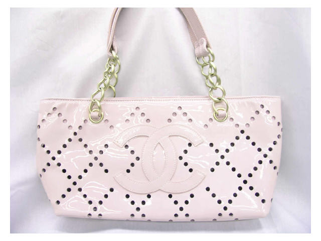 Appraisal: Chanel handbag pink patent pierced leather diamond motif with gold