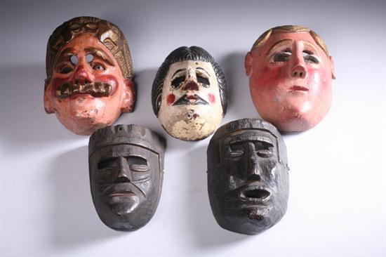 Appraisal: FIVE GUATEMALAN CARVED WOOD MASKS th century Three polychrome painted