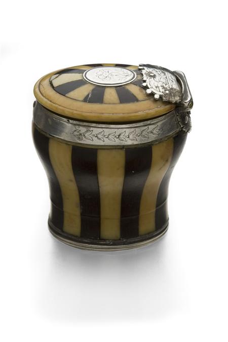 Appraisal: A Jacobean banded baluster snuff mull composed of sixteen alternating