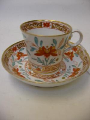 Appraisal: A CHAMBERLAIN WORCESTER PORCELAIN CUP AND SAUCER c painted and