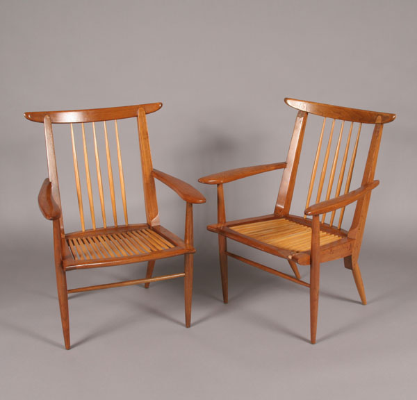 Appraisal: George Nakashima open arm chairs five spindle back turned tapered