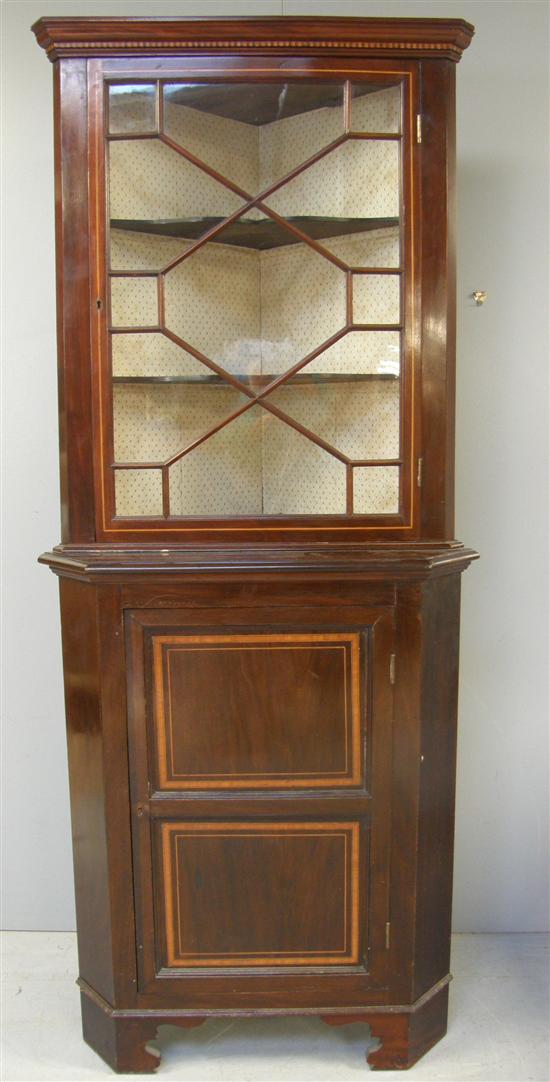 Appraisal: Edwardian mahogany boxwood strung and crossbanded standing corner cupboard the