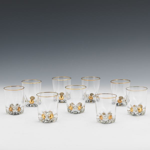 Appraisal: GILT CRYSTAL SHOT GLASSES SET OF NINE Gilt rim and