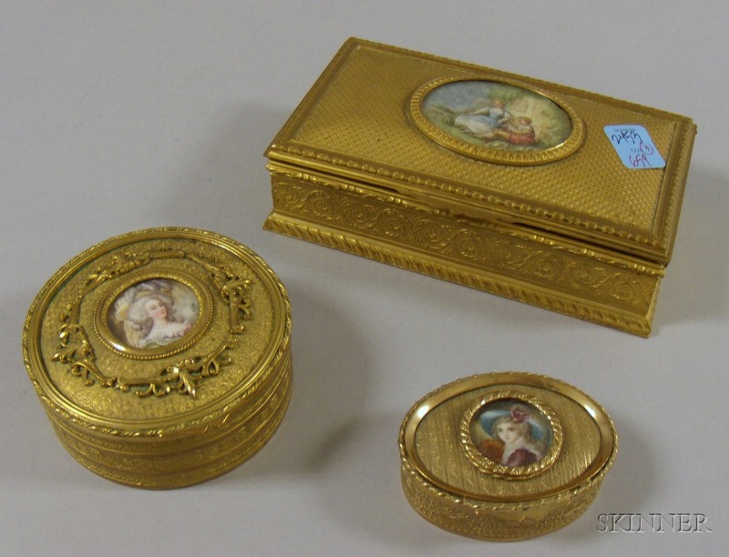 Appraisal: French Gilt-metal Cigarette Box and Two Small Trinket Jewel Boxes