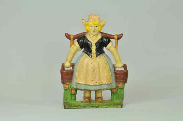 Appraisal: DUTCH MILKMAID WITH PAILS DOORSTOP Littco Products cast iron large