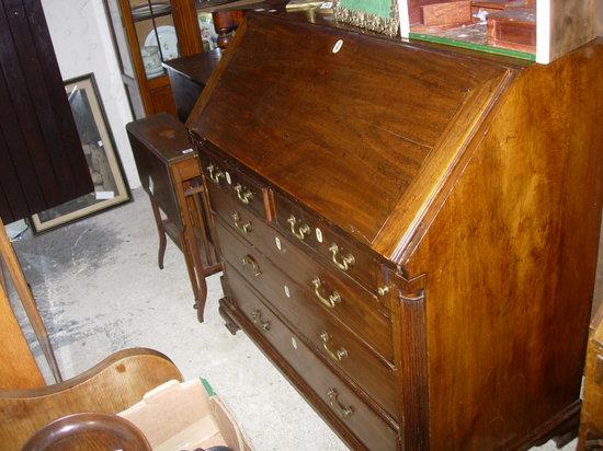 Appraisal: A GEORGE III MAHOGANY BUREAU fitted two short and three