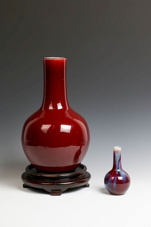 Appraisal: GROUP OF TWO VASES LATE QING Of globular form rising