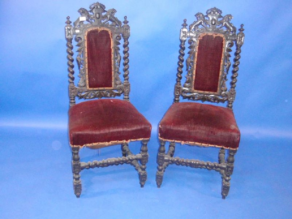 Appraisal: A pair of thC carved oak hall chairs in the