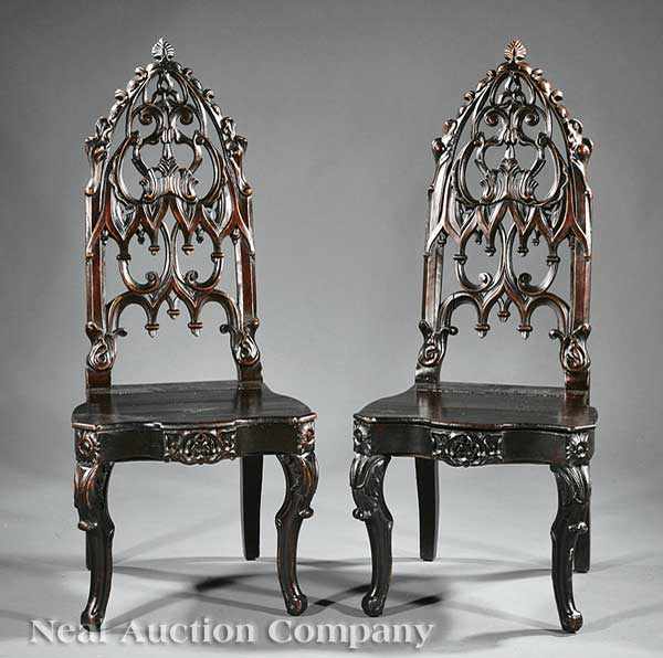 Appraisal: A Pair of American Gothic Carved Rosewood Hall Chairs c