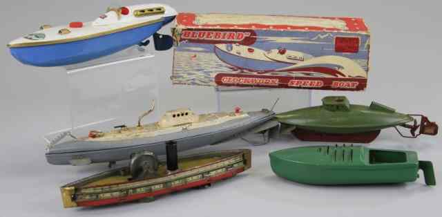 Appraisal: GROUPING OF BOATS Includes Sutcliffe Bluebird clockwork speed boat with