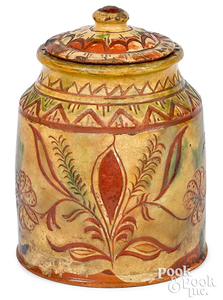 Appraisal: Pennsylvania sgraffito redware canister Bucks County Pennsylvania sgraffito redware canister