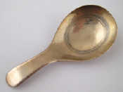 Appraisal: A Georgian silver caddy spoon with diaper pattern panel in