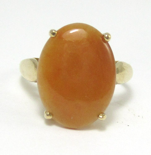 Appraisal: ORANGE JADE AND YELLOW GOLD RING The k gold ring