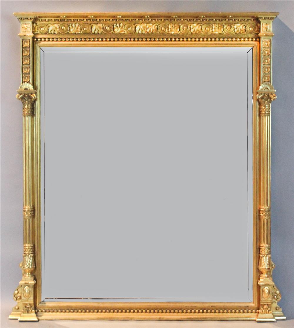 Appraisal: LARGE RECTANGULAR CLASSICAL STYLE CARVED GILTWOOD FRAMED MIRROR with a