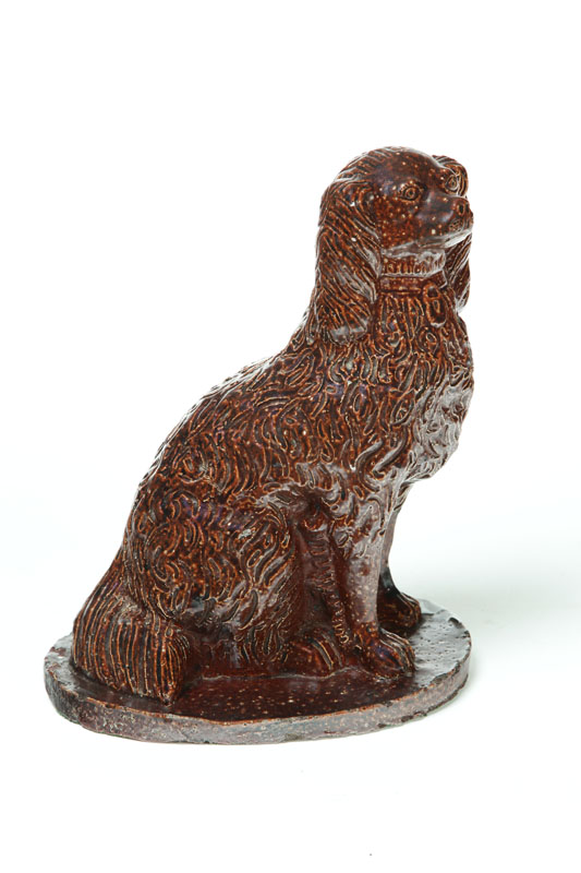 Appraisal: SEWERTILE DOG Ohio early th century Spaniel seated on an