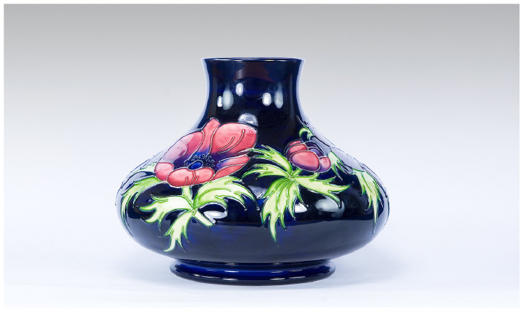 Appraisal: Moorcroft Large Onion Shaped Vase Anemone Range on Blue Ground