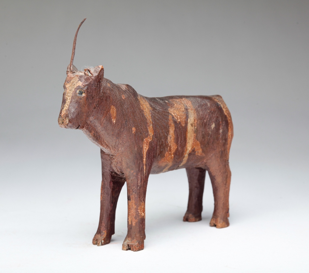 Appraisal: AMERICAN FOLK ART STEER Late th century Carved wooden steer