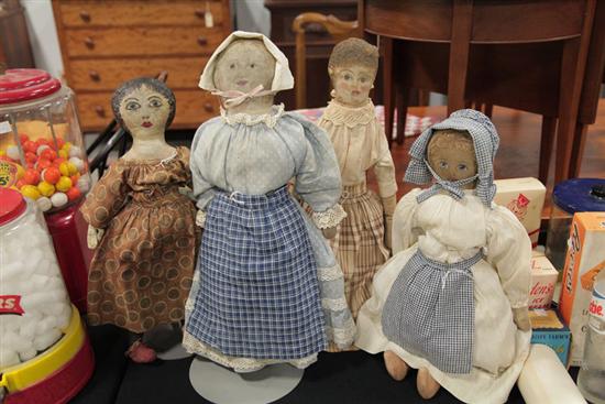 Appraisal: FOUR CLOTH DOLLS Oil painted folksy cloth dolls stuffed with