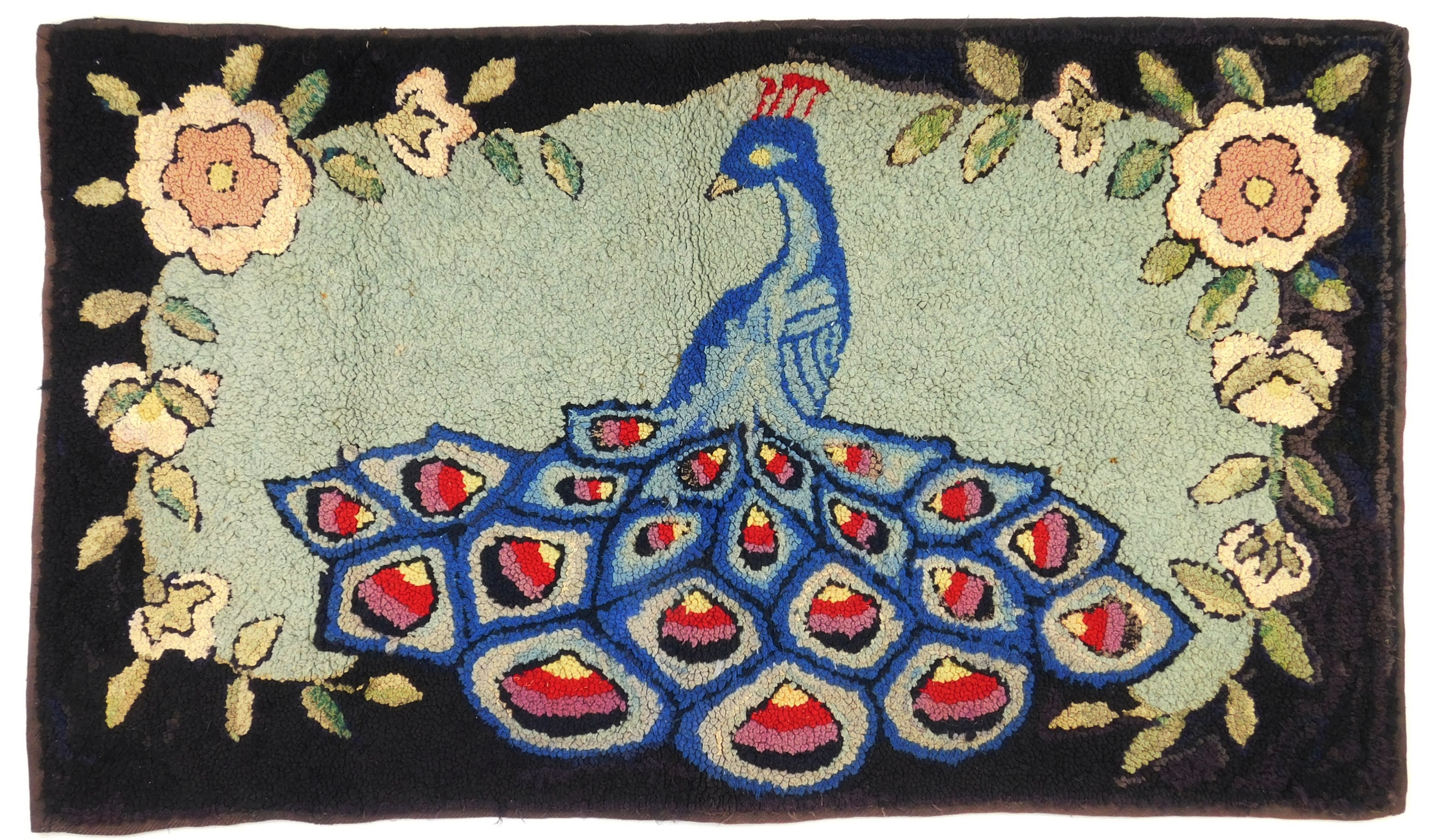 Appraisal: th c American hooked rug of a colorful peacock against