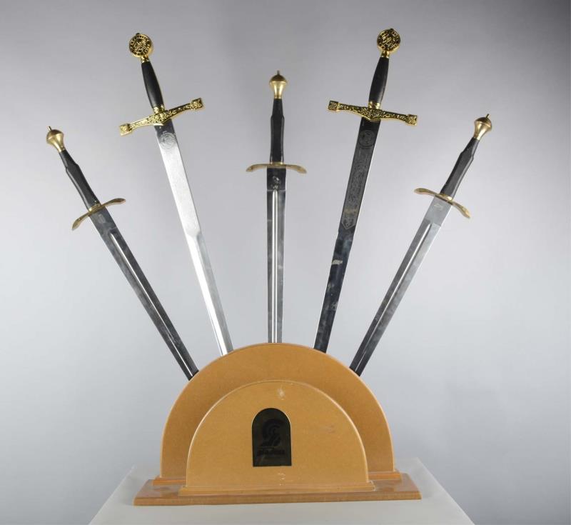 Appraisal: Set Of Swords In Sword Holder The holder is comprised