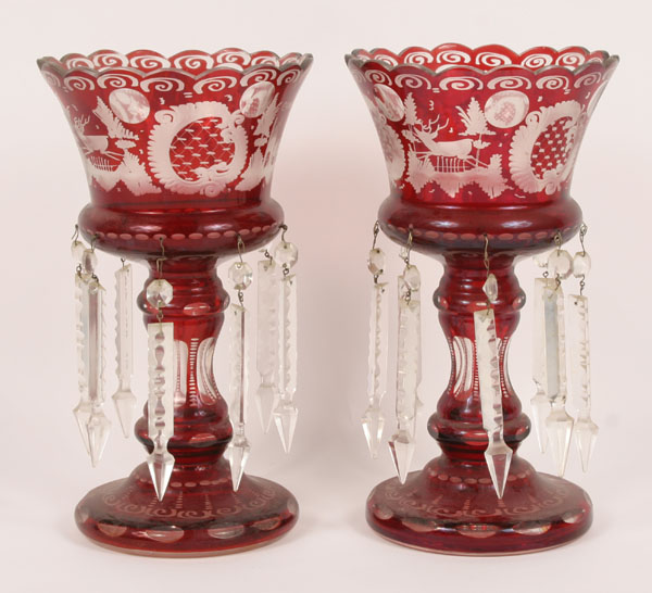 Appraisal: A pair of Bohemian glass lustres with prisms and scalloped