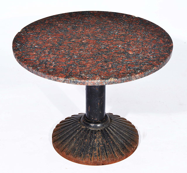 Appraisal: Zanotta of ItalyAn occasional table with cast iron base and