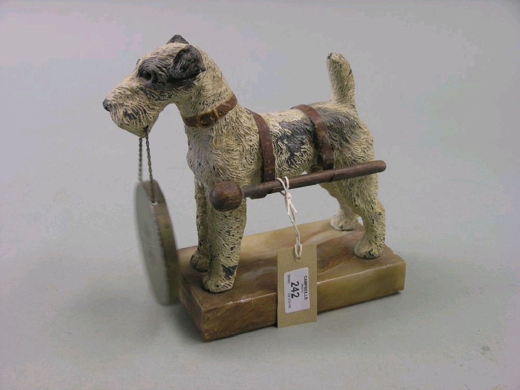 Appraisal: A cold-painted lead model of a terrier formed as a