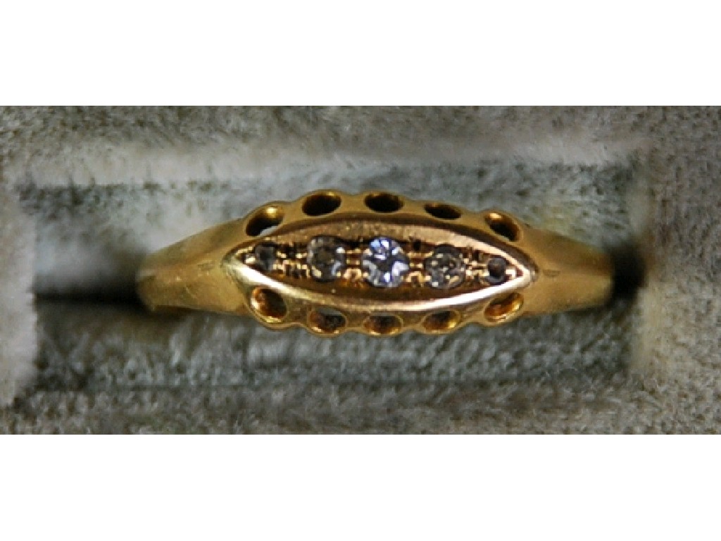 Appraisal: ct GOLD RING with a lozenge shaped setting of five