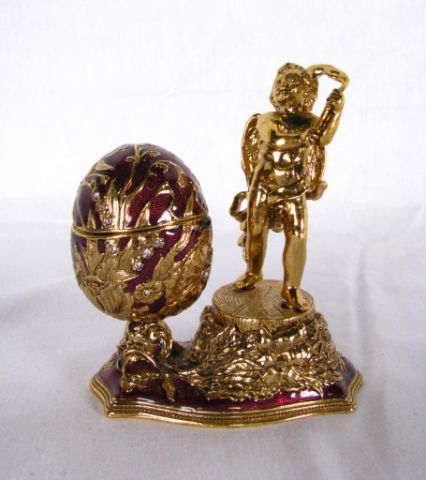 Appraisal: Edgar Berebi jeweled two piece egg on stand with angel