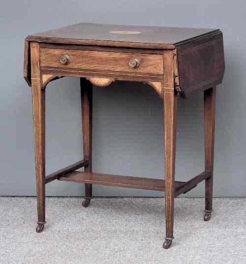 Appraisal: An Edwardian inlaid rosewood dropleaf occasional table fitted single frieze